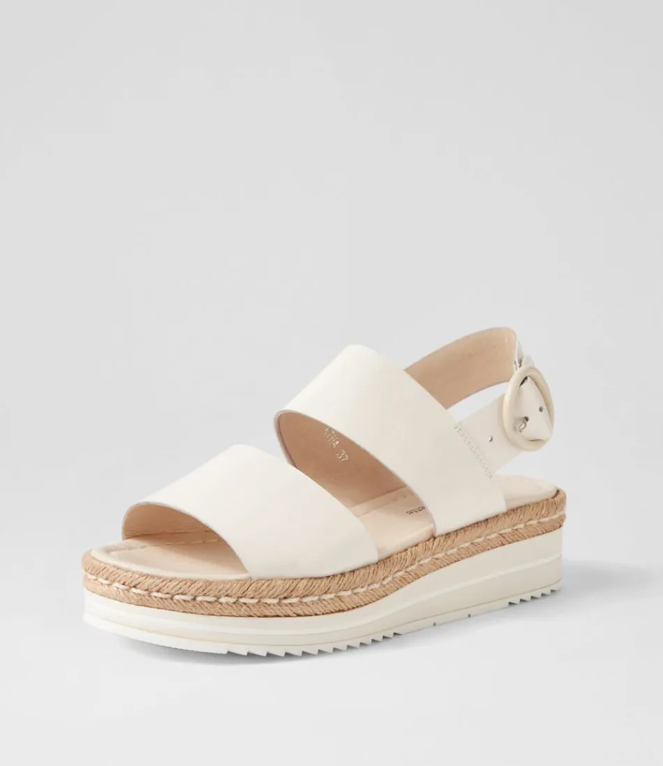 Sandales Élégantes Django & Juliette - Espadrilles Confortables en Toile et Cuir Verni Ivoire Atha 

Nuances Estivales : Modèle Femme en Cuir Laqué Brillant avec Semelle Tressée - Collection Printemps-Été