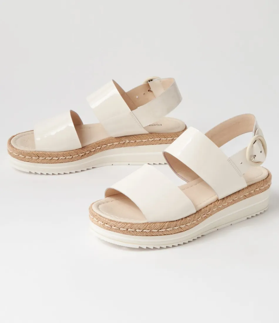 Sandales Élégantes Django & Juliette - Espadrilles Confortables en Toile et Cuir Verni Ivoire Atha 

Nuances Estivales : Modèle Femme en Cuir Laqué Brillant avec Semelle Tressée - Collection Printemps-Été