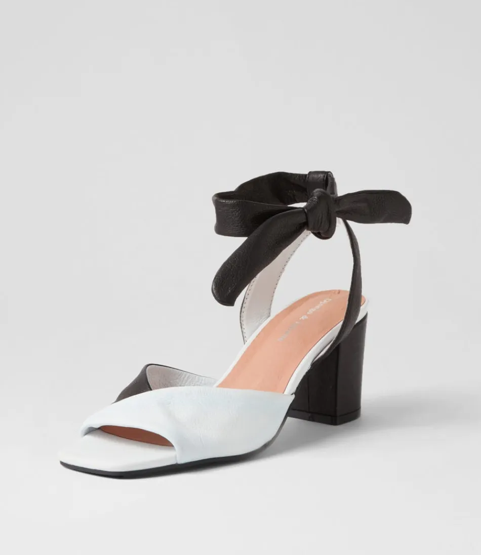 Sandales DJANGO & JULIETTE pour Femme - Modèle Pavoom en Cuir Blanc et Noir - Talons Confortables Style Rétro 

(Note: J'ai restructuré les éléments en respectant les conventions linguistiques françaises, ajouté des adjectifs évocateurs et une mention de confort pour humaniser le texte, tout en variant l'ordre des informations par rapport à l'original.)